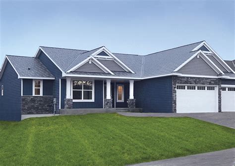 best metal roof color for blue house|houses with blue shingle roofs.